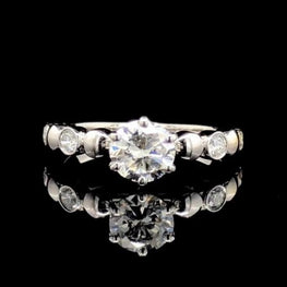 Elegant Round Cut Bezel Delicate Ring