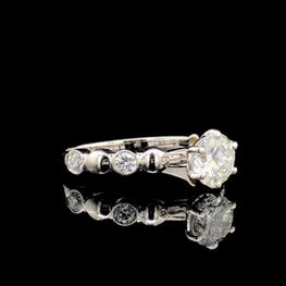 Elegant Round Cut Bezel Delicate Ring