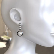 2.09 Ct round cut lab grown diamond earrings elegant bridal jewelry with brilliant sparkle and timeless design