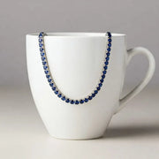 9.98 Ct round blue sapphire tennis necklace with brilliant gemstones in a luxury elegant fine jewelry design