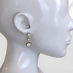 Elegant lab grown diamond earrings with brilliant cut stones set in fine gold jewelry for women