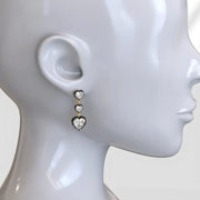 Elegant lab grown diamond earrings with brilliant cut stones set in fine gold jewelry for women