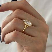 Stunning 2 ct pear shaped diamond ring with elongated design and intense fire