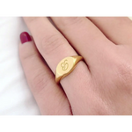 Gold initial signet ring for women with dainty personalized alphabet and minimal modern design