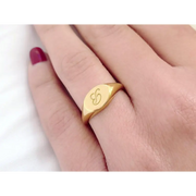 Gold initial signet ring for women with dainty personalized alphabet and minimal modern design