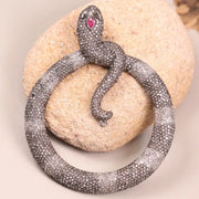 Victorian style snake brooch in sterling silver with ruby gemstone and black diamond details, gothic statement jewelry gift