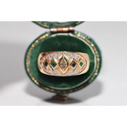 Luxury lab created gemstone ring with emerald cut green stone and diamond accents