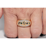Luxury lab created gemstone ring with emerald cut green stone and diamond accents