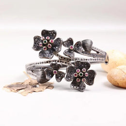 Vintage floral cuff bracelet, 925 sterling silver black oxidized bangle with green and pink ruby gemstones, unique handmade jewelry gift