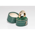 Luxury lab created gemstone ring with emerald cut green stone and diamond accents
