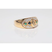 Luxury lab created gemstone ring with emerald cut green stone and diamond accents
