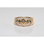Luxury lab created gemstone ring with emerald cut green stone and diamond accents