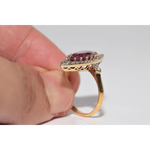 Classic lab created gemstone ring with oval amethyst stone and sparkling diamond band