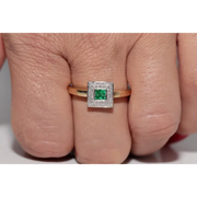 Stylish lab created gemstone ring with ruby red center stone and white diamond halo