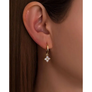 gold hoop earrings with stylish gold nugget earrings detailing and luxurious everyday jewelry appearance.