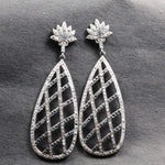 Elegant silver vintage-style Art Deco crystal drop earrings with lotus teardrop design, statement jewelry gift for her