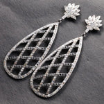 Elegant silver vintage-style Art Deco crystal drop earrings with lotus teardrop design, statement jewelry gift for her