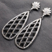 Elegant silver vintage-style Art Deco crystal drop earrings with lotus teardrop design, statement jewelry gift for her
