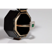 Stylish lab created gemstone ring with ruby red center stone and white diamond halo
