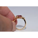 legant lab created gemstone ring with garnet red stone and sparkling diamond setting