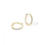 gold twist hoop earrings with elegant pearl drop earrings gold detailing for classy and fashionable jewelry styling.