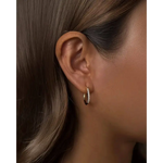 gold twist hoop earrings with elegant pearl drop earrings gold detailing for classy and fashionable jewelry styling.