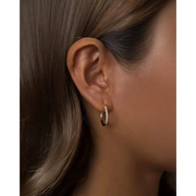 gold twist hoop earrings with elegant pearl drop earrings gold detailing for classy and fashionable jewelry styling.