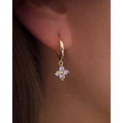 gold hoop earrings with stylish gold nugget earrings detailing and luxurious everyday jewelry appearance.
