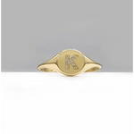 Personalized dainty gold initial ring with sleek signet style, elegant alphabet jewelry for women