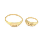 Elegant personalized gold initial ring with dainty alphabet and classic signet ring style