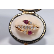 legant lab created gemstone ring with garnet red stone and sparkling diamond setting