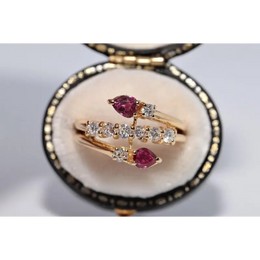 legant lab created gemstone ring with garnet red stone and sparkling diamond setting