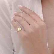 Personalized dainty gold initial ring with sleek signet style, elegant alphabet jewelry for women