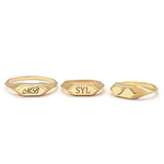Elegant personalized gold initial ring with dainty alphabet and classic signet ring style