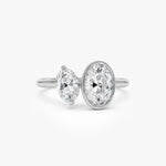 Elegant 1.50 ct oval and marquise cut lab created diamond solitaire engagement ring, featuring a brilliant elongated center stone with graceful shape and radiant sparkle