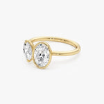 Elegant 1.50 ct oval and marquise cut lab created diamond solitaire engagement ring, featuring a brilliant elongated center stone with graceful shape and radiant sparkle