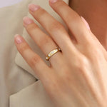 featuring a diamond sunburst. A perfect minimal jewelry piece for effortless elegance.