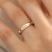 featuring a diamond sunburst. A perfect minimal jewelry piece for effortless elegance.