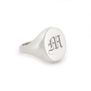 Minimalist gold initial signet ring for women with personalized alphabet detail and dainty finish