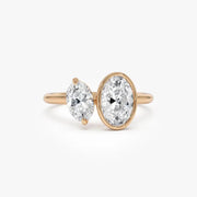 Elegant 1.50 ct oval and marquise cut lab created diamond solitaire engagement ring, featuring a brilliant elongated center stone with graceful shape and radiant sparkle