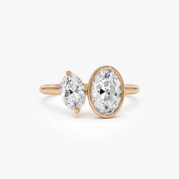 Elegant 1.50 ct oval and marquise cut lab created diamond solitaire engagement ring, featuring a brilliant elongated center stone with graceful shape and radiant sparkle