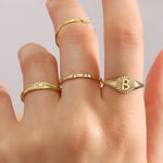 Classic 14K gold signet ring diamond sunburst design minimal timeless jewelry