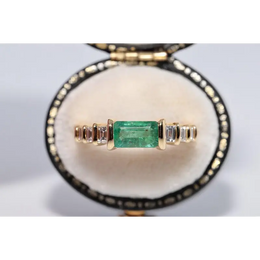 Fine lab created gemstone diamond ring with round pink center and brilliant white diamond setting