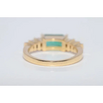 Fine lab created gemstone diamond ring with round pink center and brilliant white diamond setting