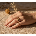 Matching diamond-studded couple rings for a luxurious and romantic bond.