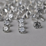 lab grown blue diamond and yellow diamond jewelry including lab diamond chain and hoop earrings collection