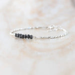 bracelet gold and with Black diamond uncut and uncut Black diamond luxury jewelry display.