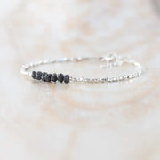 bracelet gold and with Black diamond uncut and uncut Black diamond luxury jewelry display.