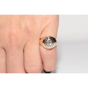Elegant lab created gemstone ring with garnet red stone and sparkling diamond setting