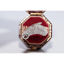 Unique lab created gemstone ring with topaz center stone and white diamond details